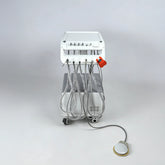 Front view of the mobile veterinary dental unit with an integrated oil-free compressor cabinet and locking wheels, designed for quiet operation