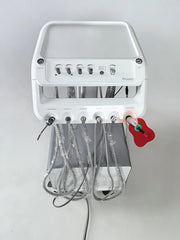 Close-up of the PT-668D instrument tray showing adjustable control knobs for air and water, alongside slots for a 3-way syringe, scaler, and curing light